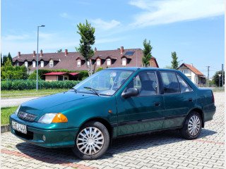 SUZUKI SWIFT Sedan 1.6 GX VONÓHOROG - AZONNAL VIHETŐ (2000)